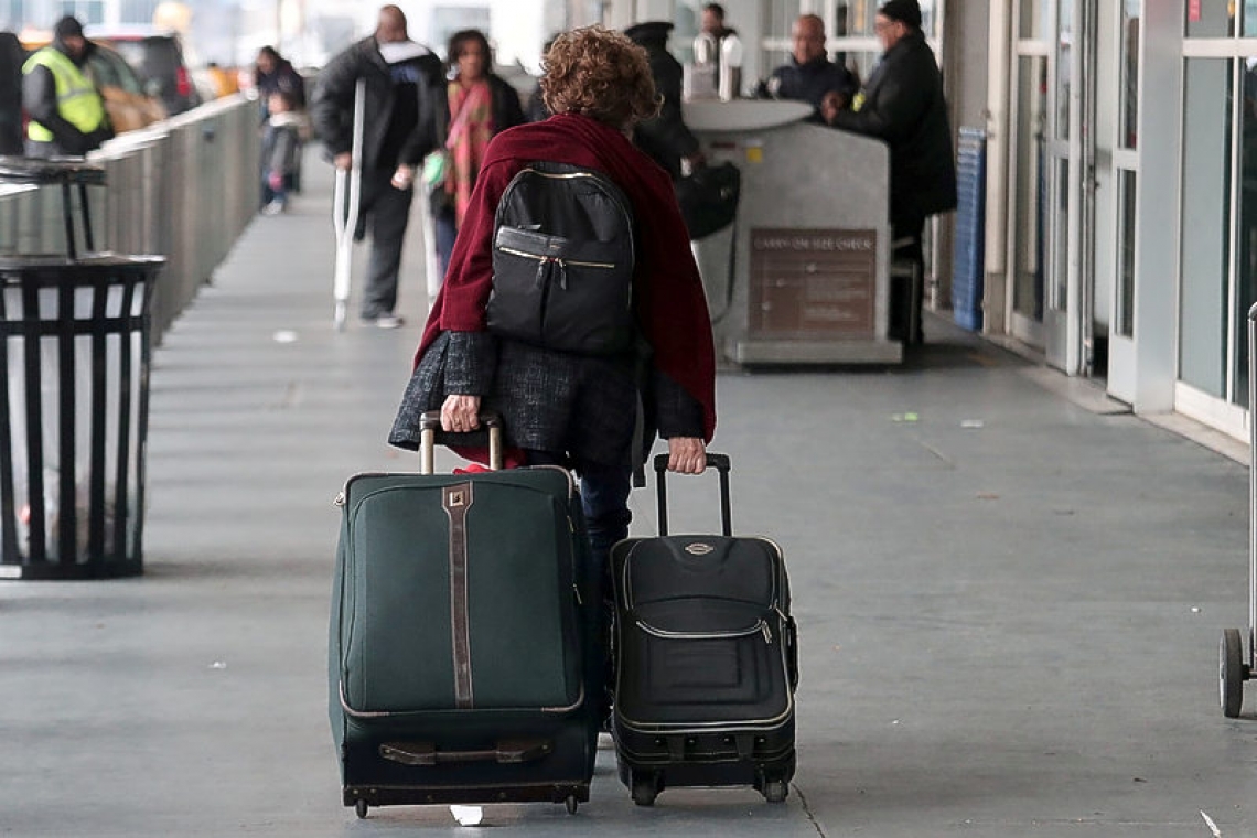 New York sues US administration over 'punitive' ban from traveler programs